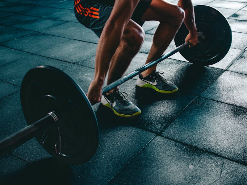 Person lifting weights for conversion optimisation